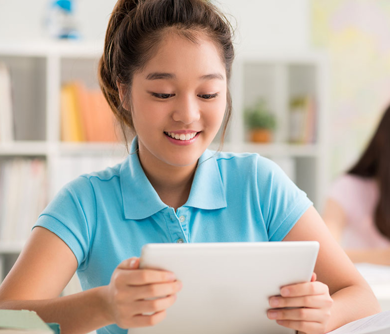 Student and teacher give high fives